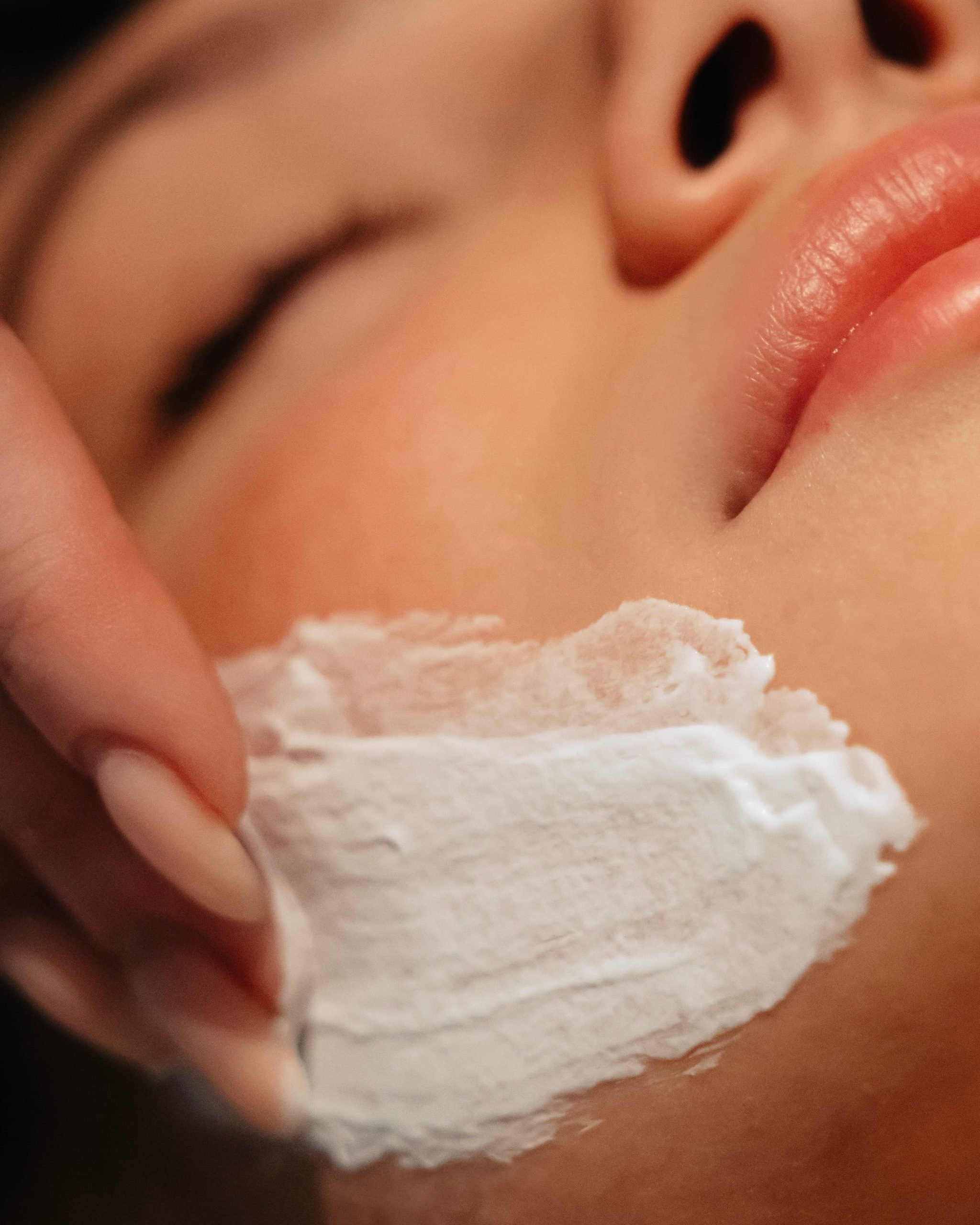 Woman receiving a facial at Lapis spa