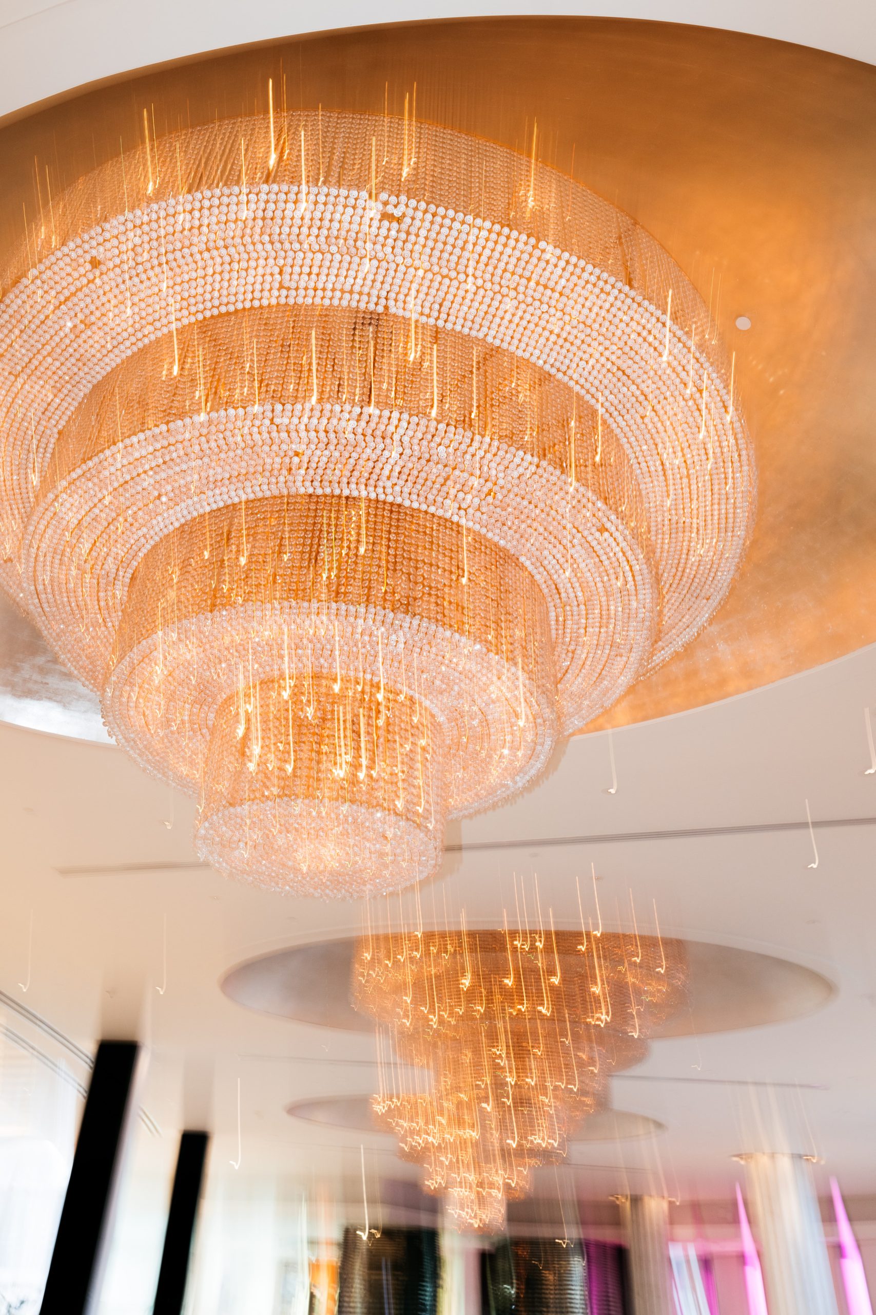 Two Blurry Gold Chandeliers